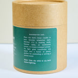 Meet Haus Fells Point soy candle, a Baltimore neighborhood scent: side of the kraft tube box with suggested use for a reading nook or bedside table and a note to trim the wick to 1/4 inch before lighting.